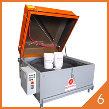 HotWash manual parts washer showing interior cleaning chamber