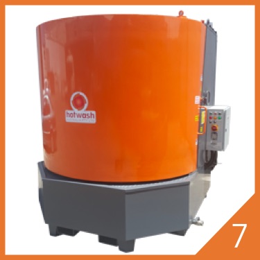 Orange cylindrical hot tank washer on wheeled base