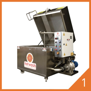 Heavy-duty spray washer with open door revealing internal spray system