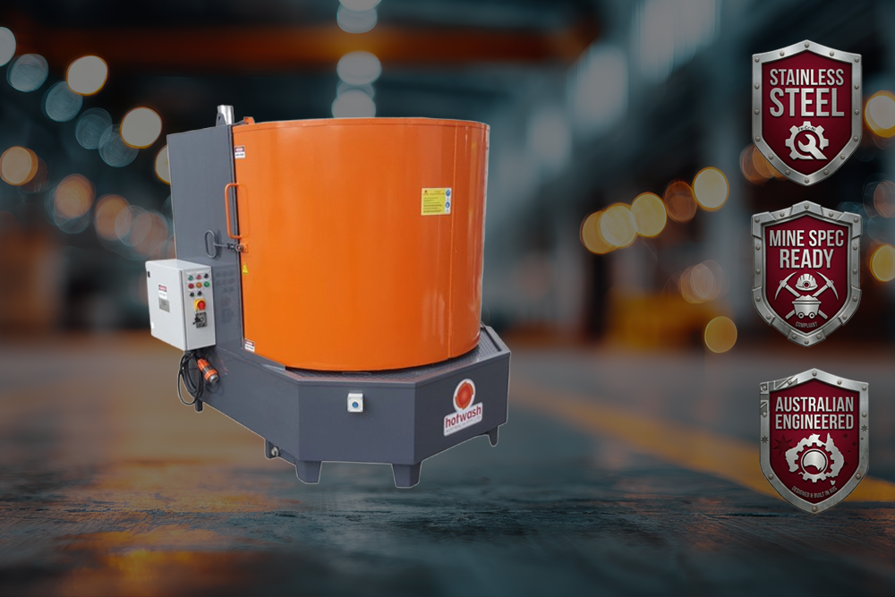 Orange hot tank parts washer on wheeled industrial base