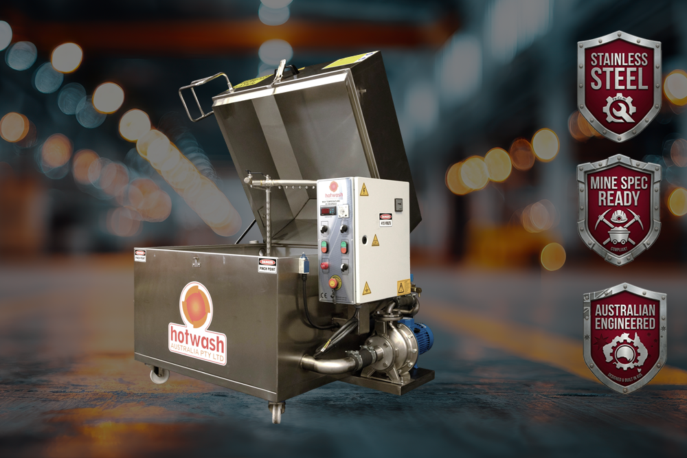 Heavy-duty spray washer with hopper feed system