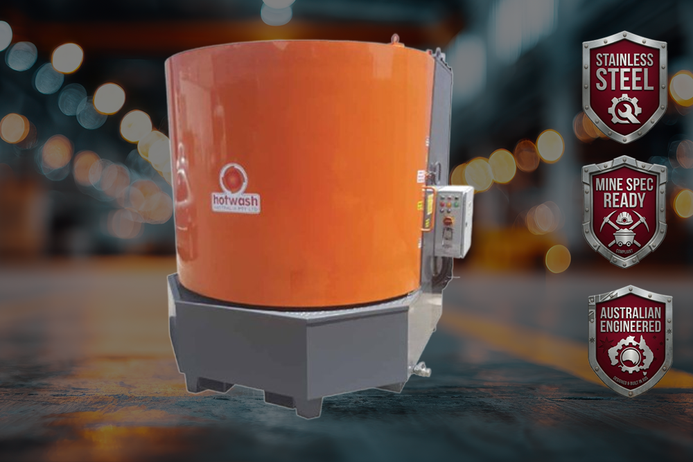 Orange hot tank parts washer on wheeled base